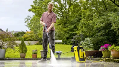 Parent cleaning with children watching